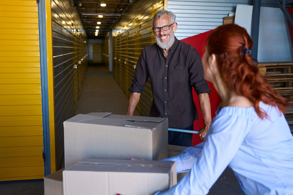 Customer loading boxes into a storage facility
